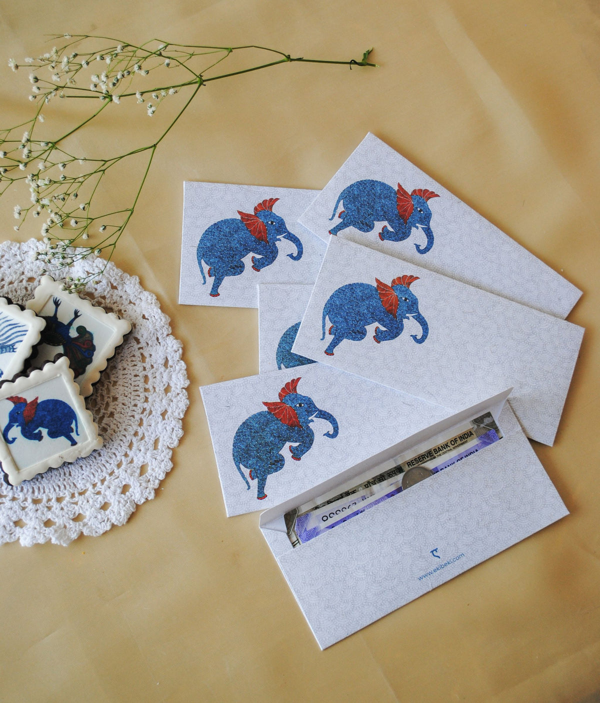 Artwork by native craftsmen of Chitrakathi, Gond, that are used as motifs to create stationery. This one is the gajoba elephant motif