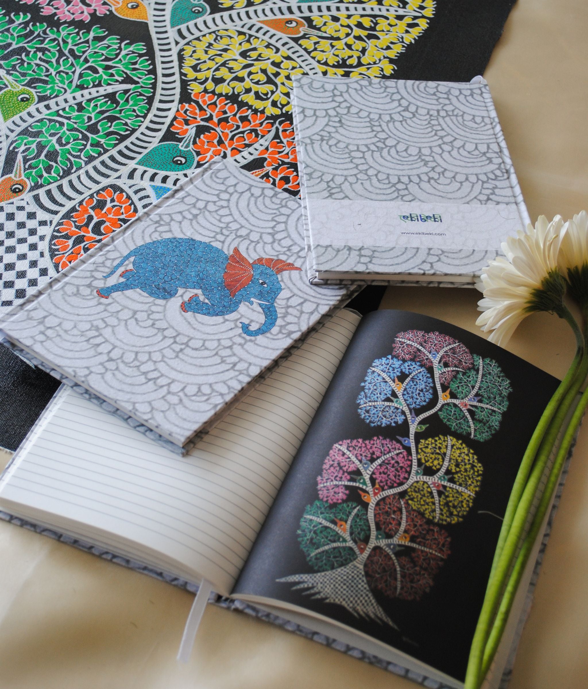 Artwork by native craftsmen of Chitrakathi, Gond, that are used as motifs to create stationery. This one is the gajoba elephant motif