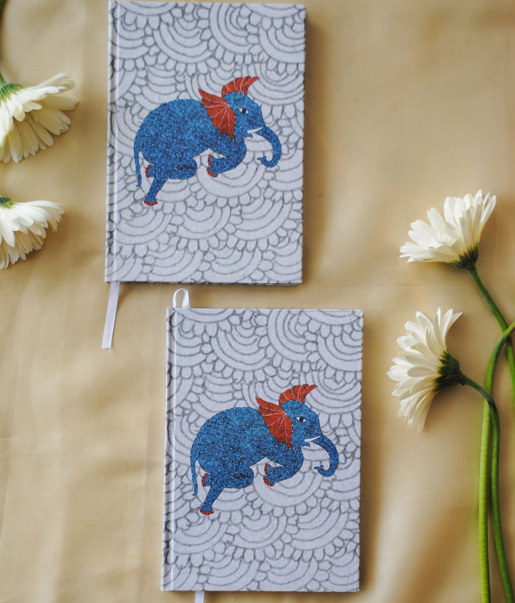 Artwork by native craftsmen of Chitrakathi, Gond, that are used as motifs to create stationery. This one is the gajoba elephant motif