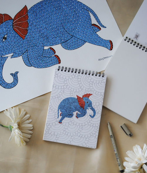 Artwork by native craftsmen of Chitrakathi, Gond, that are used as motifs to create stationery. This one is the gajoba elephant motif
