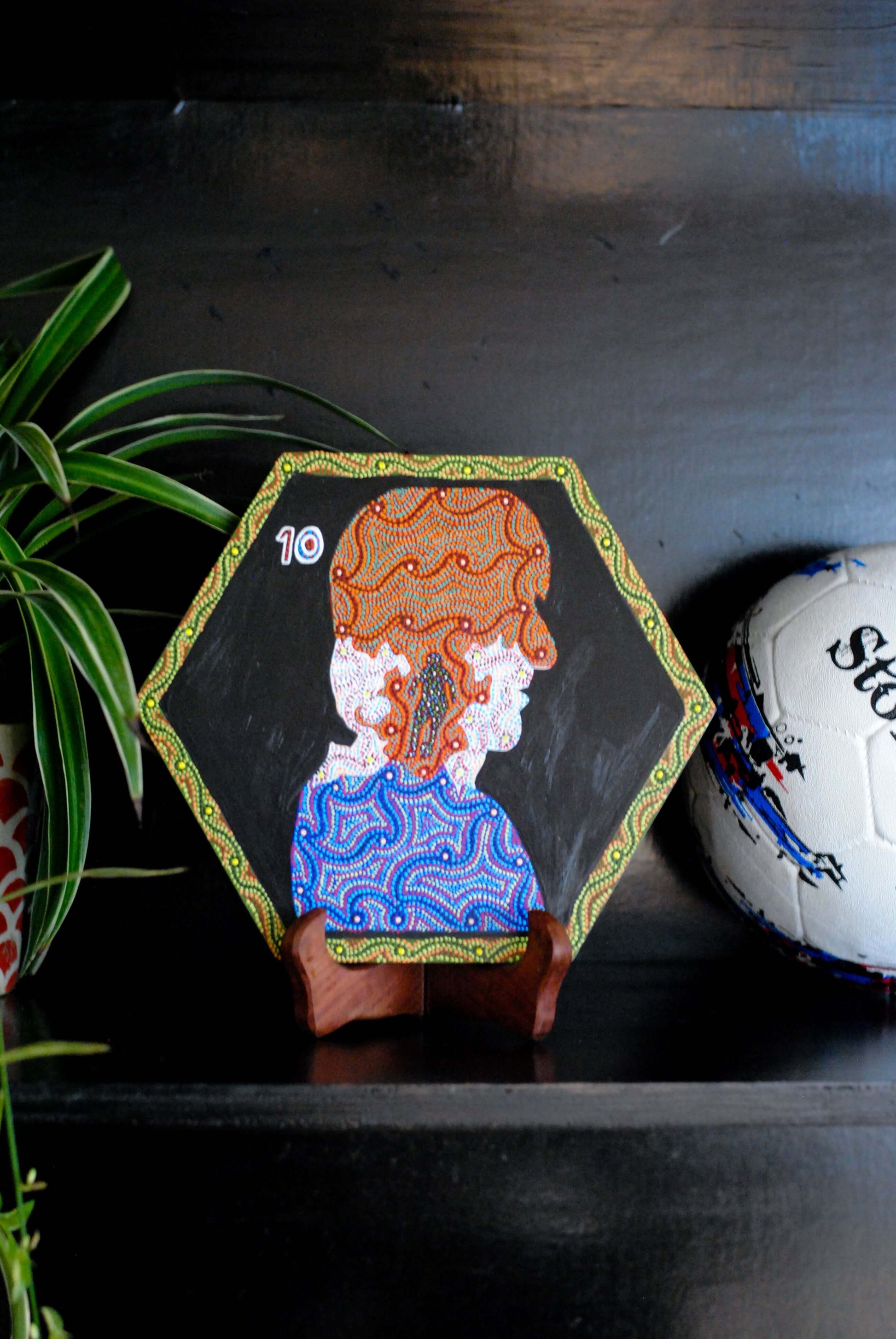 Copper enameled wallplates to celebrate FIFA legacies, Luka Modric in Bhil painting. With The Plated Project
