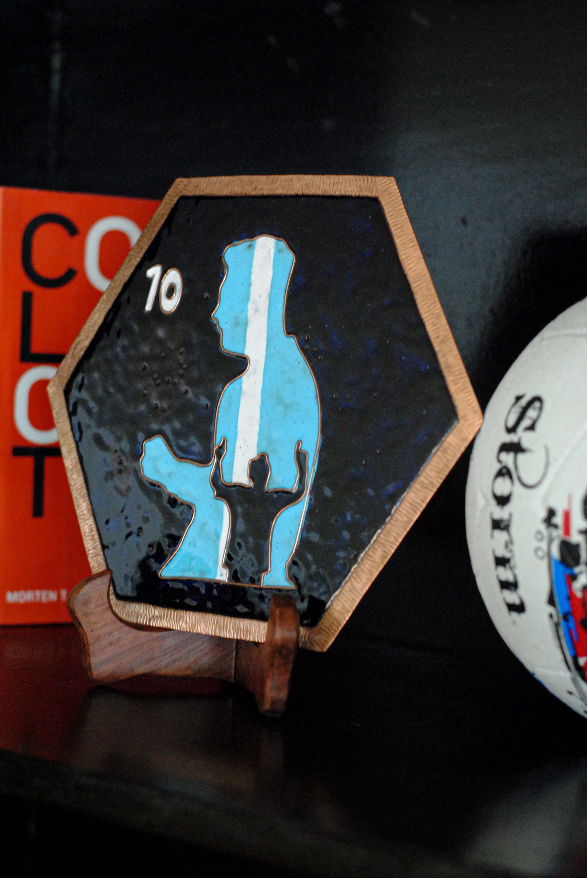 Copper enameled wallplates to celebrate FIFA legacies, Messi. With The Plated Project
