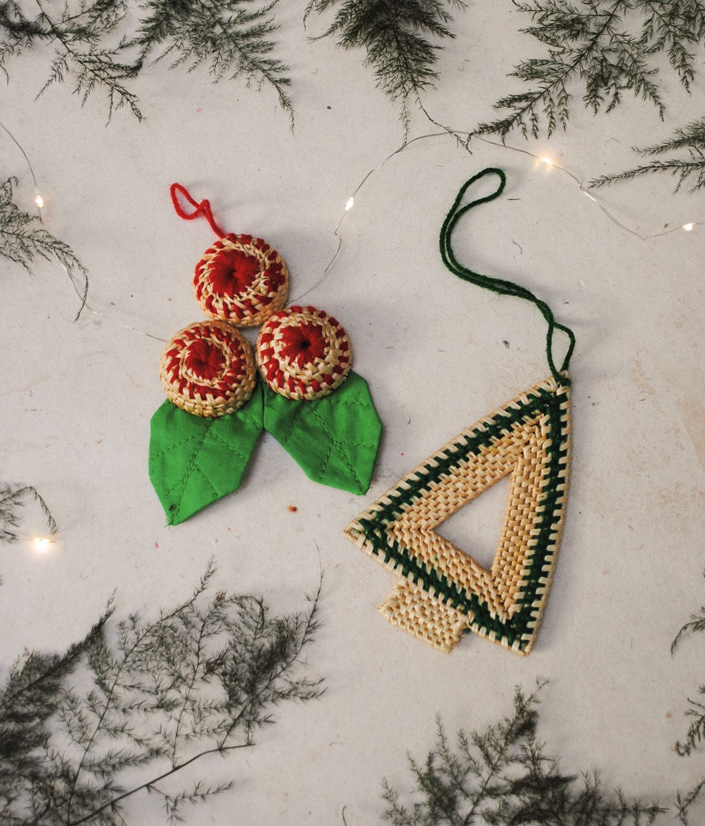 Handcrafted golden grass weavers create Christmas ornaments as new designs to keep the old art relevant in modern days