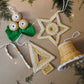 Handcrafted golden grass weavers create Christmas ornaments as new designs to keep the old art relevant in modern days