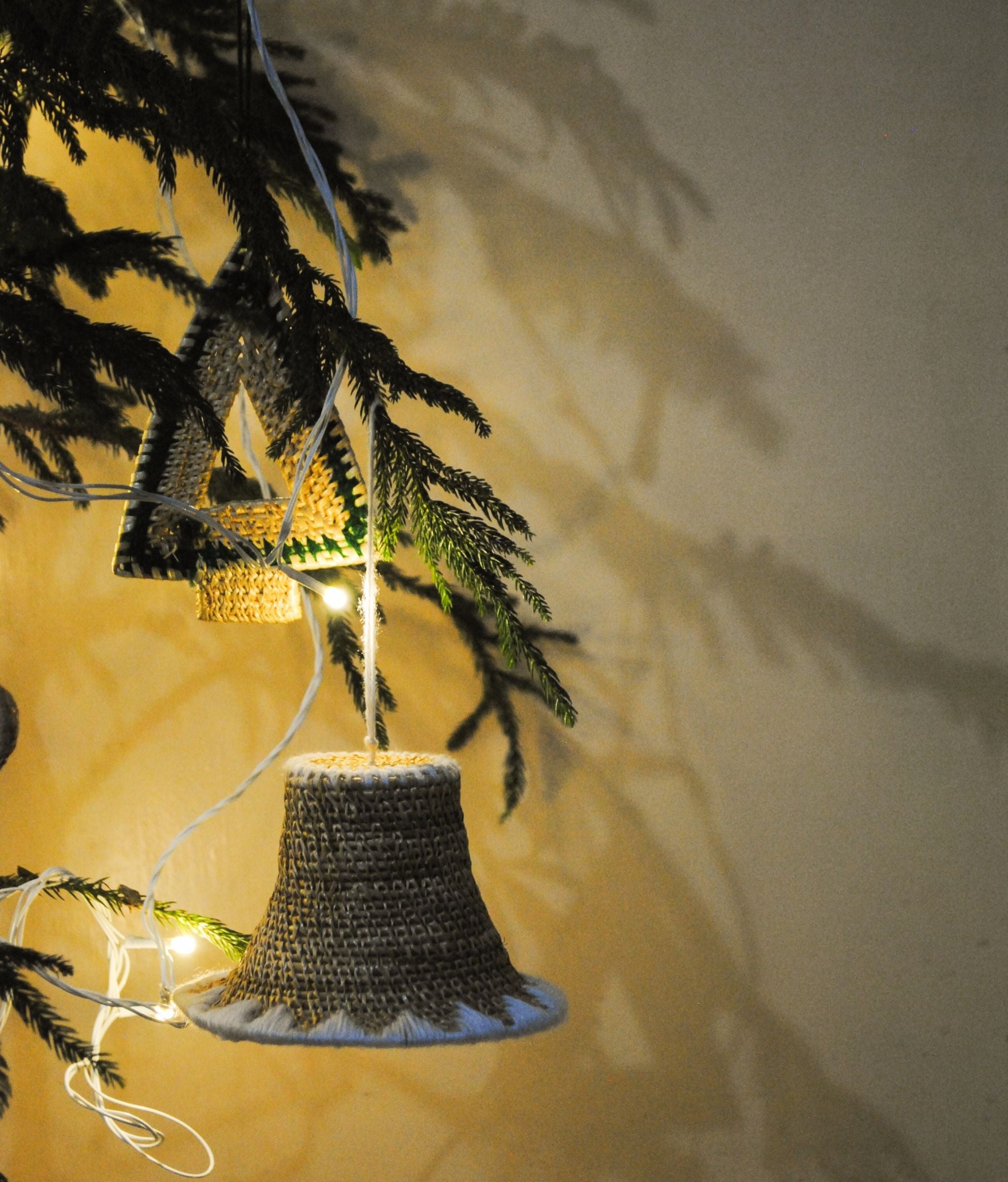 Handcrafted golden grass weavers create decorative items for Christmas, as new designs to keep the old art relevant in modern days
