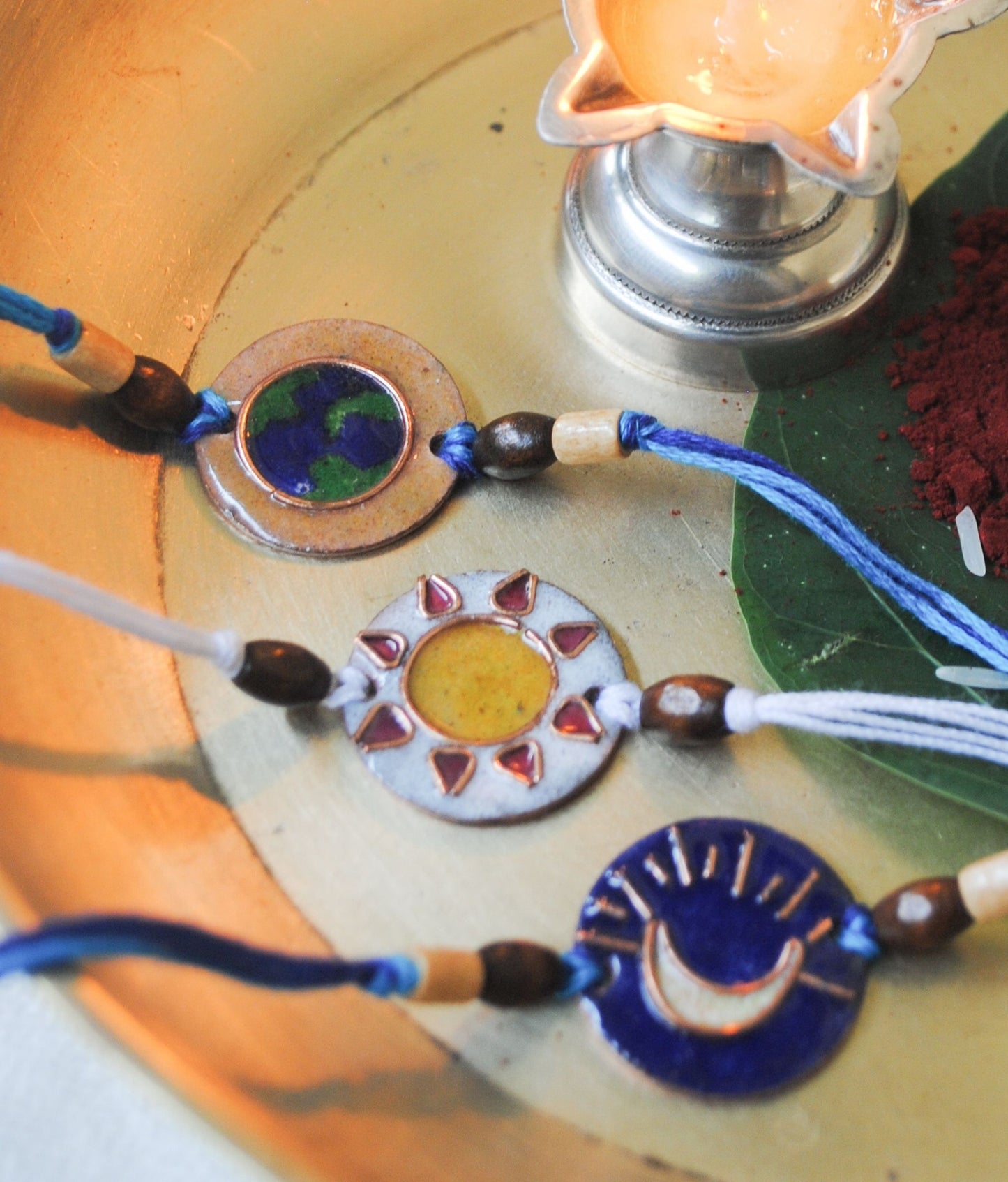 Handcrafted "Sooraj" Copper Enamel Rakhi by EkiBeki