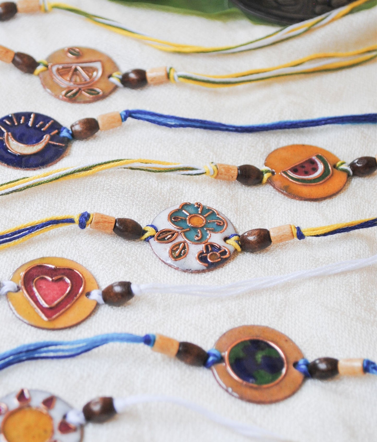 Handcrafted "Tarbooz" Copper Enamel Rakhi by EkiBeki