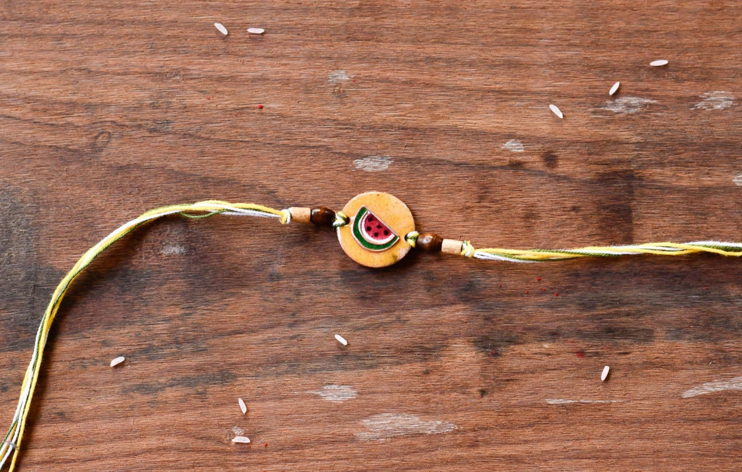 Handcrafted "Tarbooz" Copper Enamel Rakhi by EkiBeki