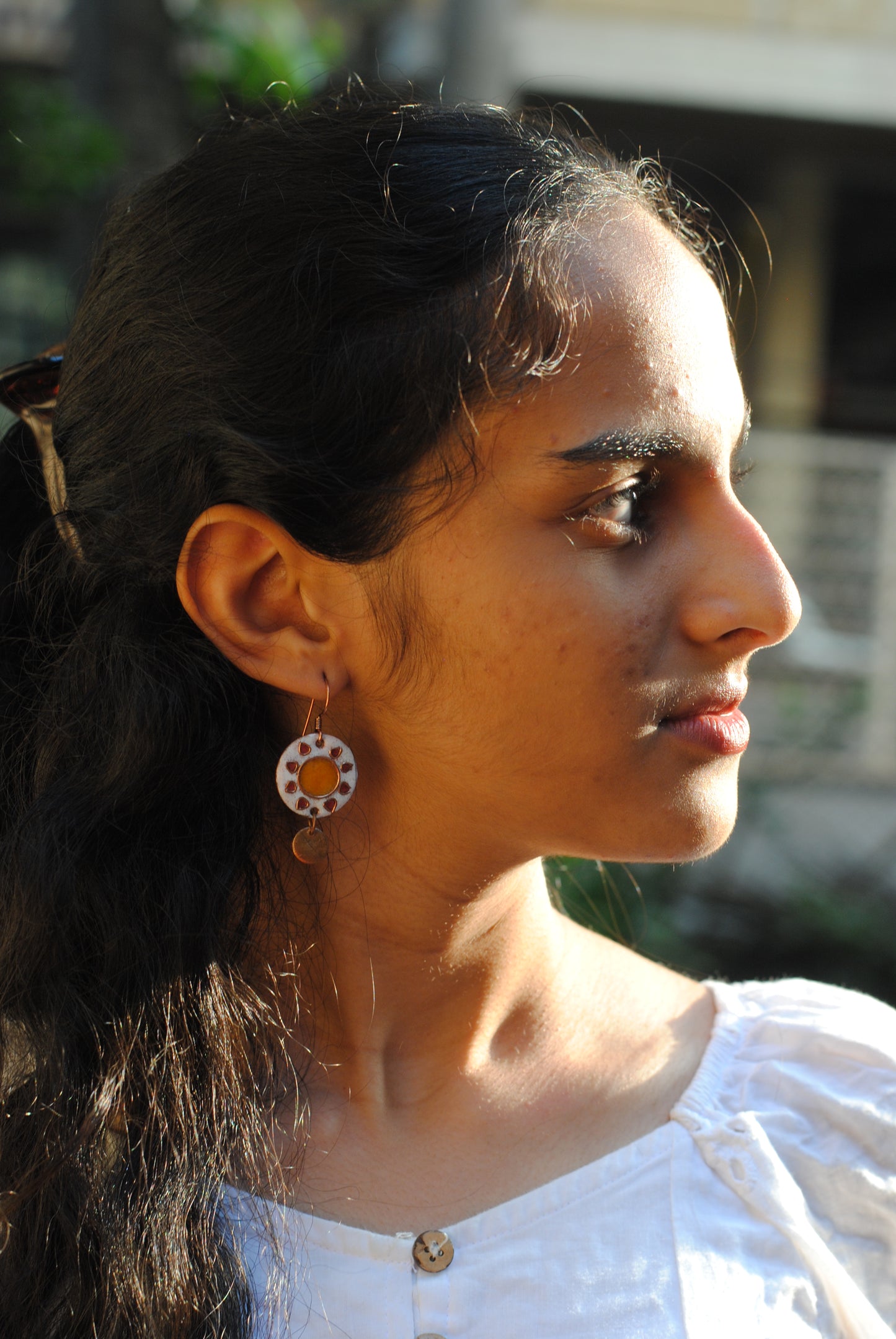 Copper enamel trinkets, funky earrings handcrafted in Maharashtra, India. Sun sooraj theme