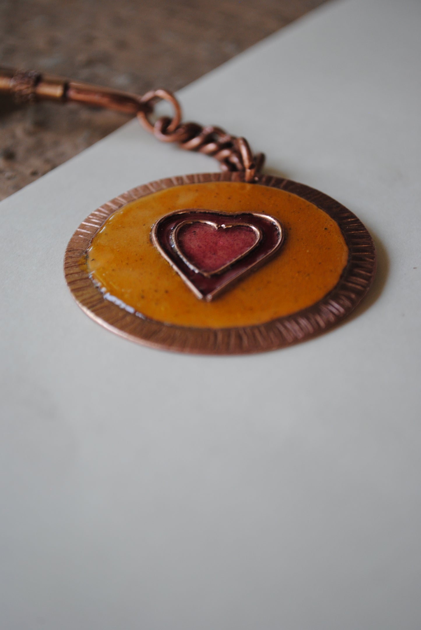 Copper enamel trinkets, funky keychains handcrafted in Maharashtra, India. Dil heart theme