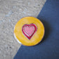 Copper enamel trinkets, funky lapel pin handcrafted in Maharashtra, India. Dil heart theme