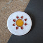 Copper enamel trinkets, funky lapel pins handcrafted in Maharashtra, India. Sun sooraj theme