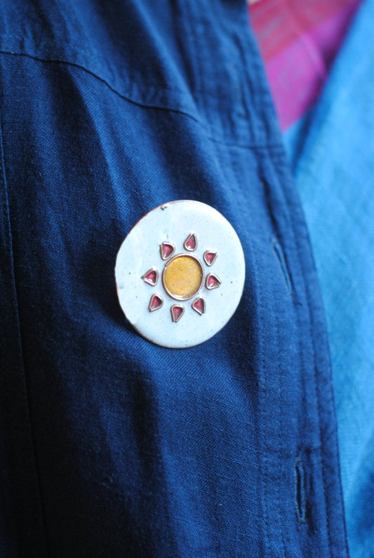 Copper enamel trinkets, funky lapel pins handcrafted in Maharashtra, India. Sun sooraj theme
