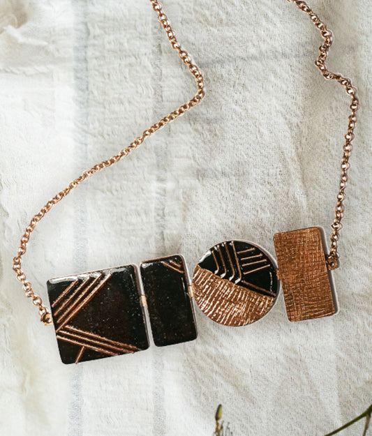 Copper enamel jewelry, geometry designs handcrafted in Maharashtra, India. Sun theme