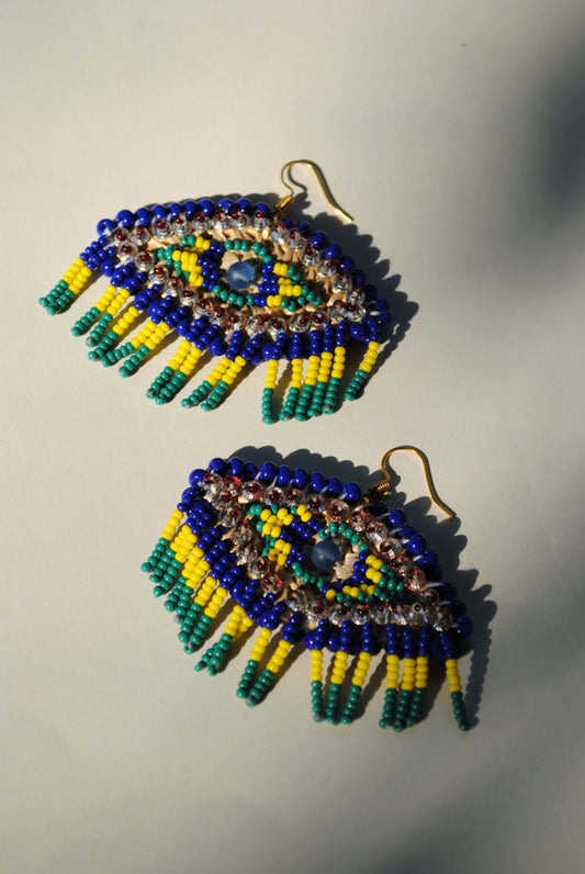 Truna natural fibre golden grass and zardosi handcrafted jewelry from Odisha, nazar blue earrings
