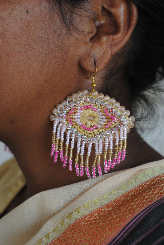 Truna natural fibre golden grass and zardosi handcrafted jewelry from Odisha, nazar pink earrings