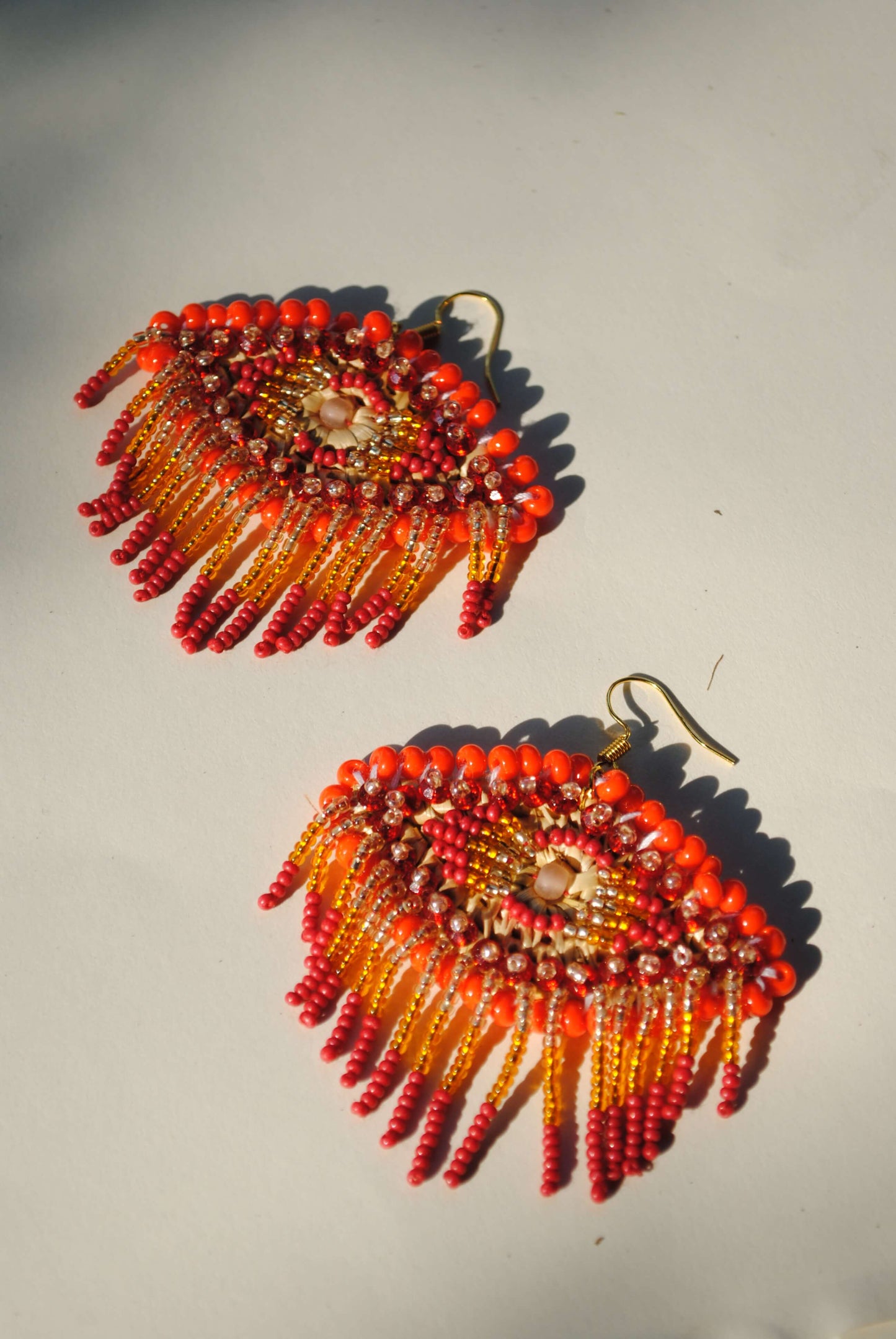 Truna natural fibre golden grass and zardosi handcrafted jewelry from Odisha, nazar red earrings