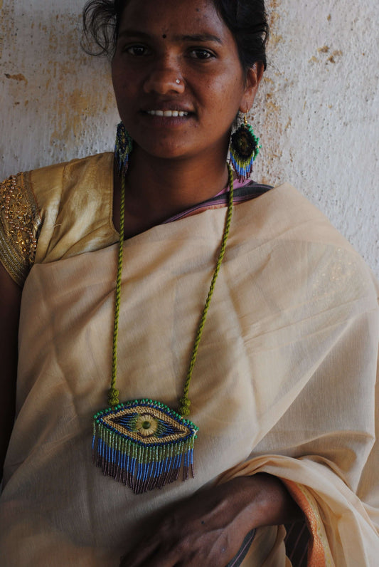 Truna natural fibre golden grass and zardosi handcrafted jewelry from Odisha, nazar peacock blue earrings and necklace set