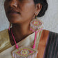 Truna natural fibre golden grass and zardosi handcrafted jewelry from Odisha, nazar pink pendant and earrings set