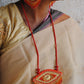 Truna natural fibre golden grass and zardosi handcrafted jewelry from Odisha, nazar red pendant and earrings set