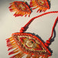 Truna natural fibre golden grass and zardosi handcrafted jewelry from Odisha, nazar red pendant and earrings set