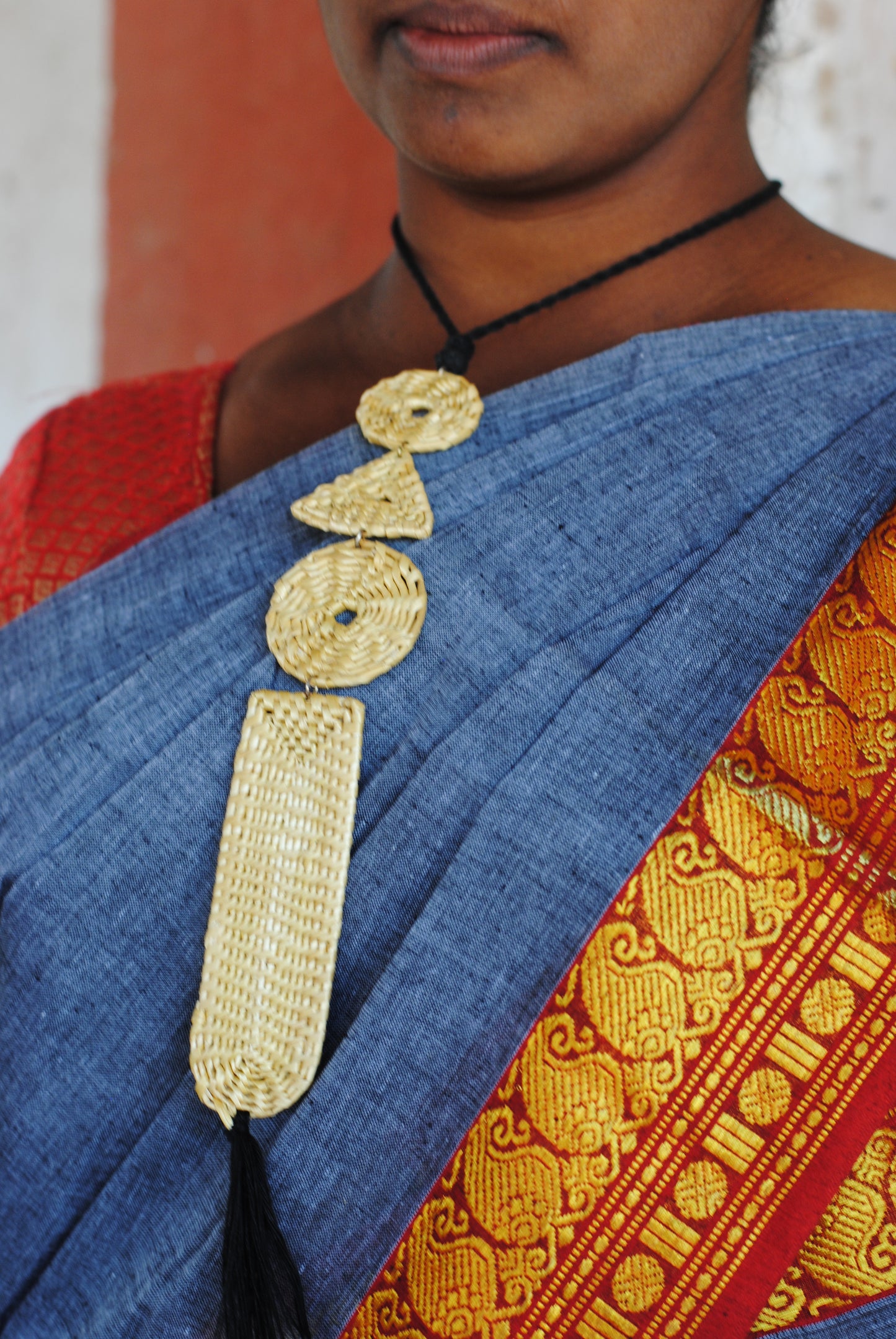 Truna natural fibre golden grass handcrafted jewelry from Odisha. Bhumiti pendant
