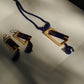 Truna natural fibre golden grass and copper enamel handcrafted jewelry from Odisha. Jharokha pendant and earring set