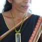 Truna natural fibre golden grass and copper enamel handcrafted jewelry from Odisha. Jharokha pendant