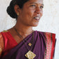 Truna natural fibre golden grass and beaten copper handcrafted jewelry from Odisha, Chaukon pendant