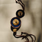 Truna natural fibre golden grass and copper enamel handcrafted jewelry from Odisha, Vaati blue enamel pendant