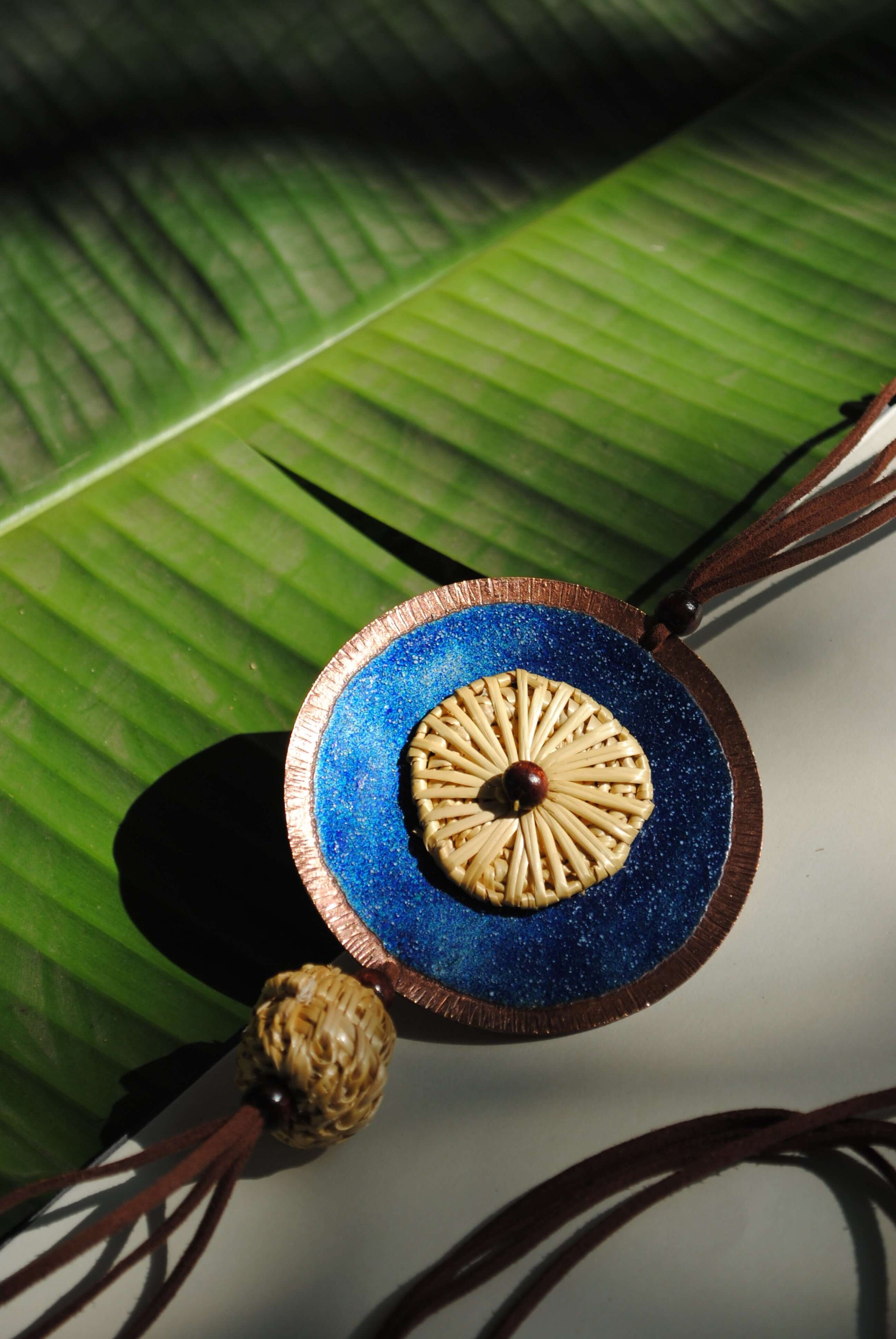 Truna natural fibre golden grass and copper enamel handcrafted jewelry from Odisha, Vaati blue pendant