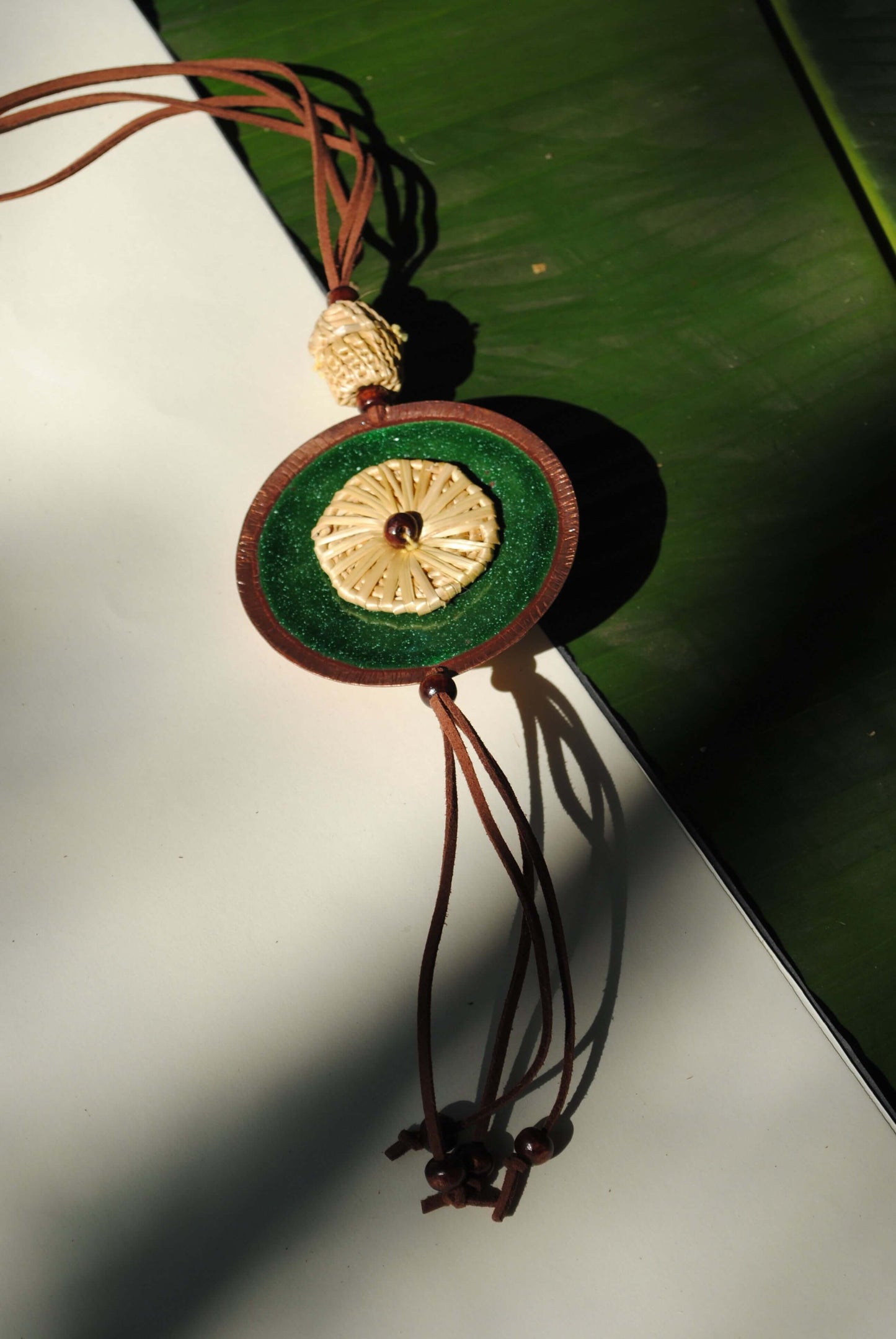 Truna natural fibre golden grass and copper enamel handcrafted jewelry from Odisha, Vaati green pendant