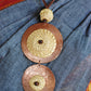 Truna natural fibre golden grass and copper enamel handcrafted jewelry from Odisha, Vaati red pendant