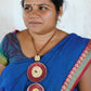 Truna natural fibre golden grass and copper enamel handcrafted jewelry from Odisha, Vaati red enamel pendant