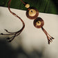 Truna natural fibre golden grass and copper enamel handcrafted jewelry from Odisha, Vaati red enamel pendant