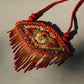 Truna natural fibre golden grass and zardosi handcrafted jewelry from Odisha, nazar red pendant